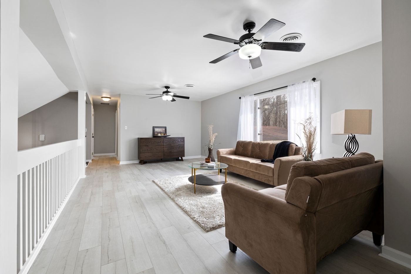 A living room photographed by a customer, with a NextGen floor laid in by the visualizer